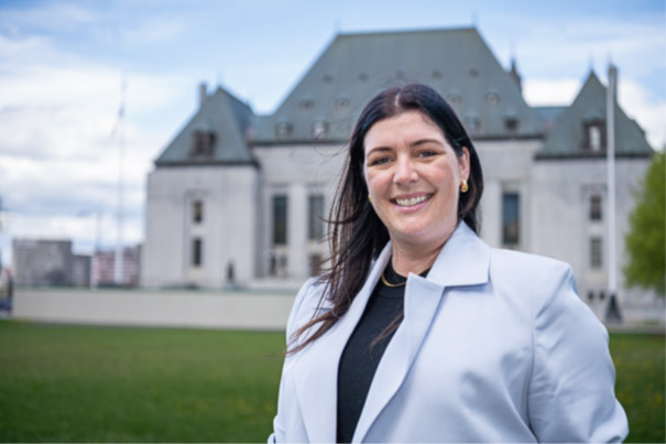 Arianne in front of the Supreme Court building where she celebrated one of her mentors being appointed to the Tax Court